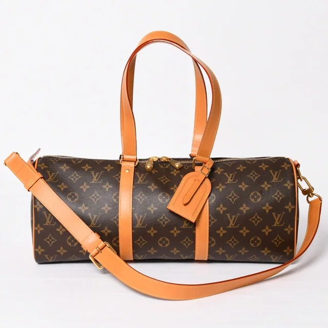 Louis Vuitton Needle Bag Monogram Canvas Archive Pharrell Williams Brown Gold in Brown Coated canvas from The Reluxe