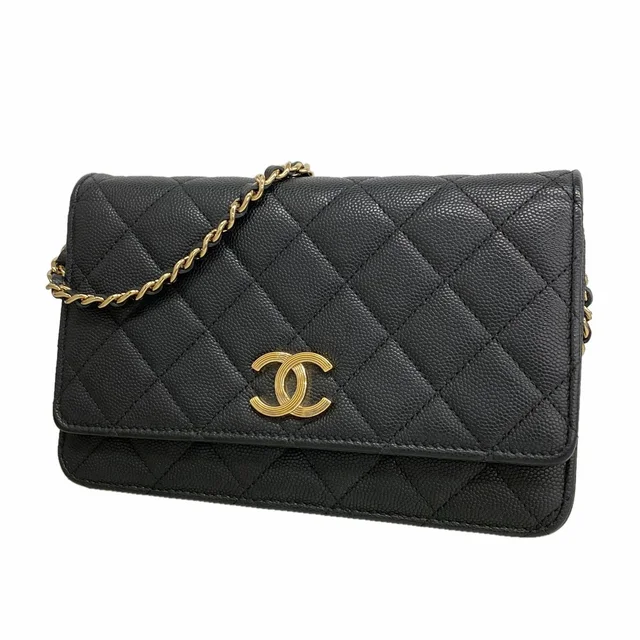 Chanel Wallet on Chain Quilted Caviar Leather Black Champagne Gold Shoulder Bag in Black Caviar leather from The Reluxe