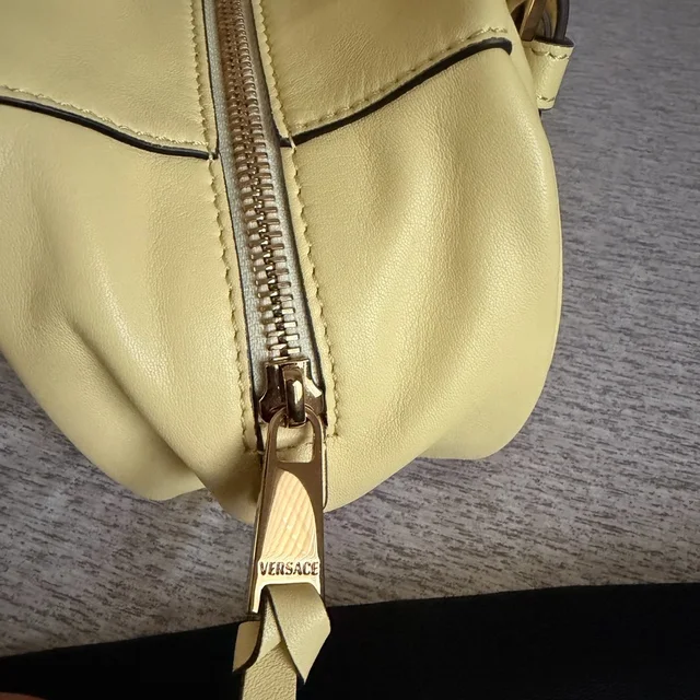 Versace Tag Nappa Bowling Bag in yellow Nappa leather from Poshmark, photo 9 of 15