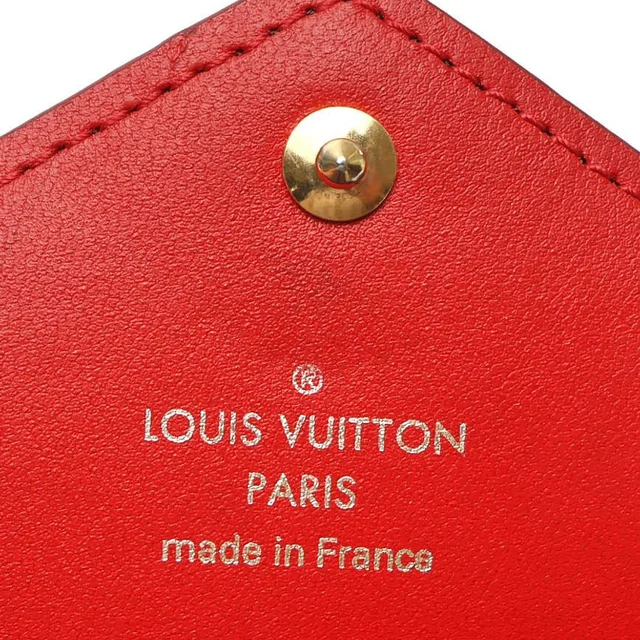 Louis Vuitton Monogram Kirigami Pochette Bag in Coated canvas from A Retro Tale, photo 4 of 5