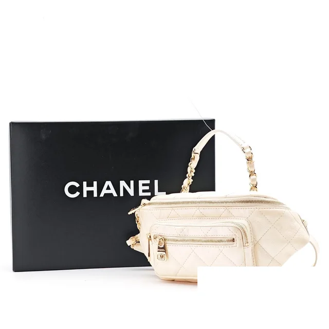 Chanel Quilted Waist Bag White in White Lambskin from The Reluxe