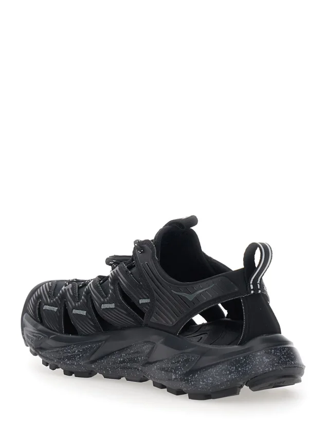 HOKA 'Hopara' Black Sandals with high rubber sole and logo lettering on the side in Tech Fabric Unisex in Black 100% Textile/Rubber, photo 4 of 6 from Gaudenzi Boutique