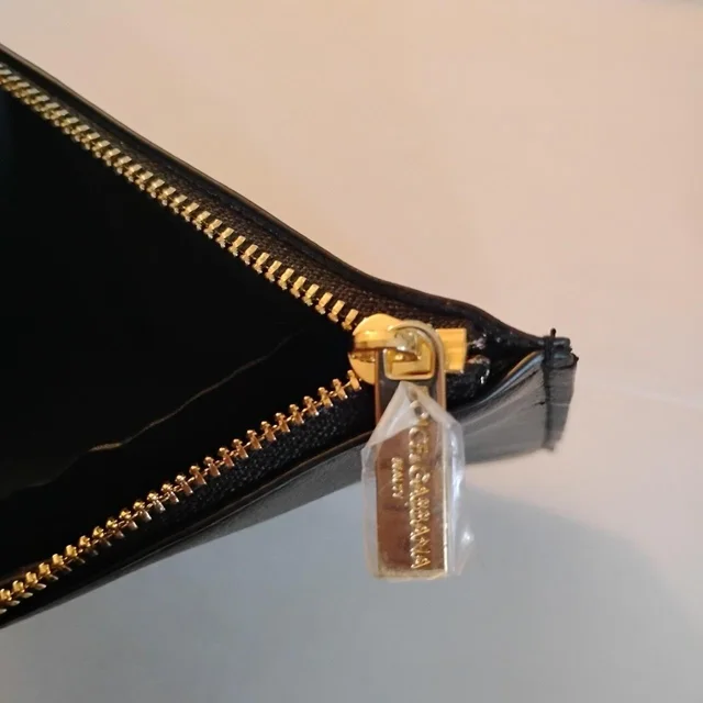 Dolce & Gabbana Women's Clutch bags - Black/Gold in gold|black from Depop, photo 6 of 9