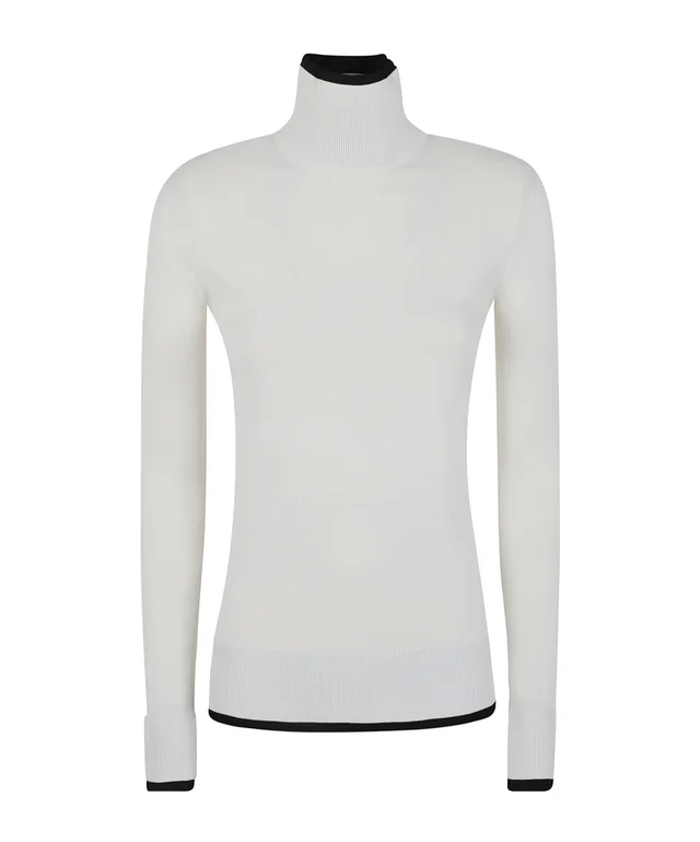 Toteme ribbed-knit turtleneck sweater from SENSER, photo 1 of 1