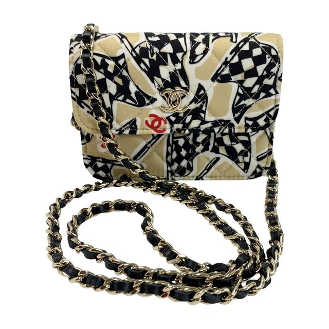 Chanel Accessory Pouch Black Gold Ladies Checkered Flag in Black from The Reluxe