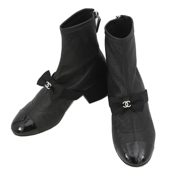 Chanel Short boots with ribbon and CC logo BlackG40099 Leather Patent Leather Faux Pearl Size 34 C in Patent leather from GALLERY RARE