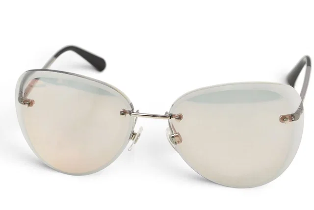 Chanel Sunglasses Eyewear Teardrop Rimless Black in Black from The Reluxe