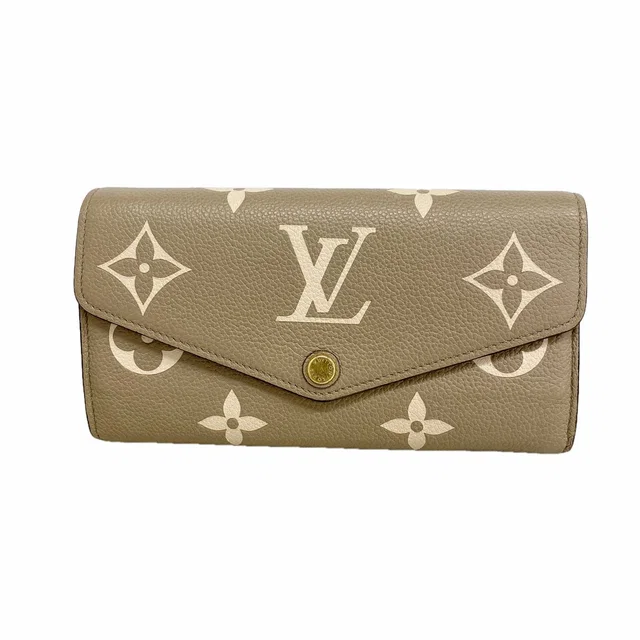 Louis Vuitton Wallet Monogram Empreinte Bicolor Portefeuille Sarah NM from The Reluxe
