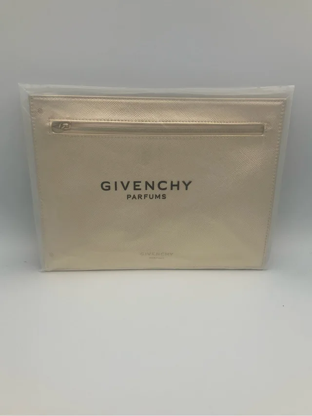 Givenchy Parfums Purse in gold from Poshmark