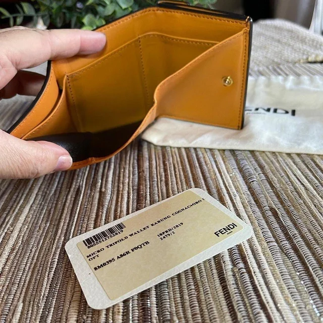 Fendi Women's Wallet - Orange in orange from Depop, photo 5 of 9