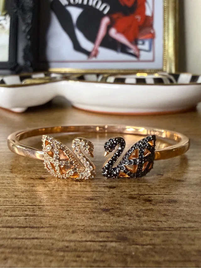 Swarovski Rose Gold Swan Crystal Bangle Bracelet in white|pink from Poshmark