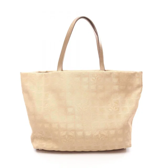 Chanel Tote Bag New Travel Line Large Gold Leather in Gold Leather from The Reluxe