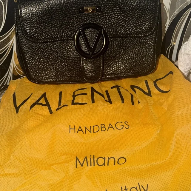 Valentino Garavani Pebbled Leather Shoulder Bag With V Logo in black Leather from Poshmark
