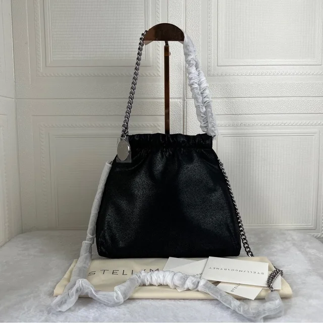 Stella McCartney Falabella Drawstring Crossbody Bag in black from Poshmark