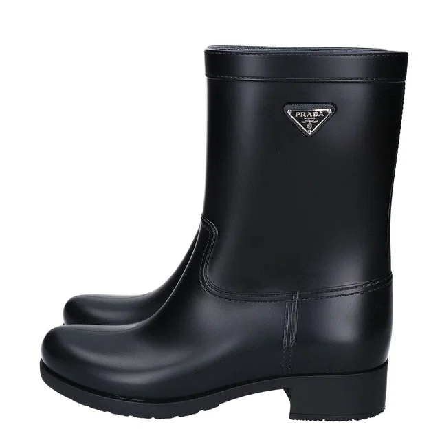 Prada Triangle Logo Rain Boots from The Reluxe
