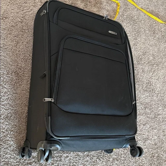 Samsonite Black Travel Suitcase in black|gray from Poshmark