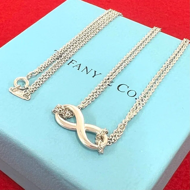Tiffany & Co. Vintage Infinity Necklace 925 Sterling Silver Pendant in Silver from The Reluxe