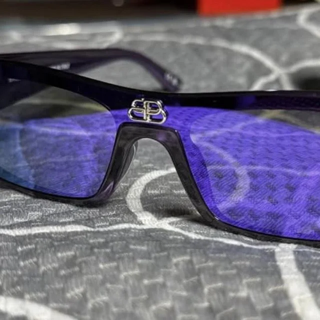 Balenciaga Women's Sunglasses - Purple in purple from Depop, photo 1 of 1
