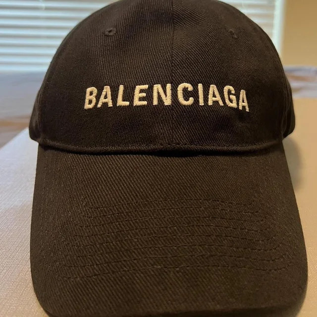 Balenciaga Men's Hat - Black/Navy in blue|black from Depop, photo 1 of 1