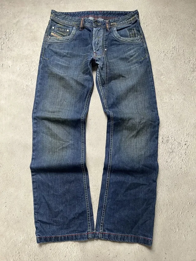 Vintage Retro Diesel Washed Effect Distressed Jeans in blue from Grailed