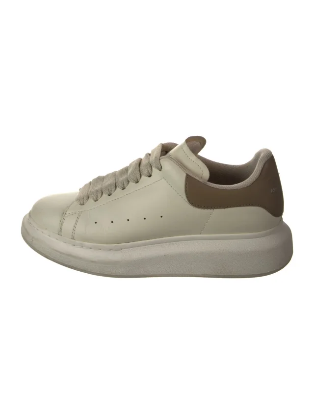 Alexander McQueen sneakers & athletic in green Leather from The RealReal