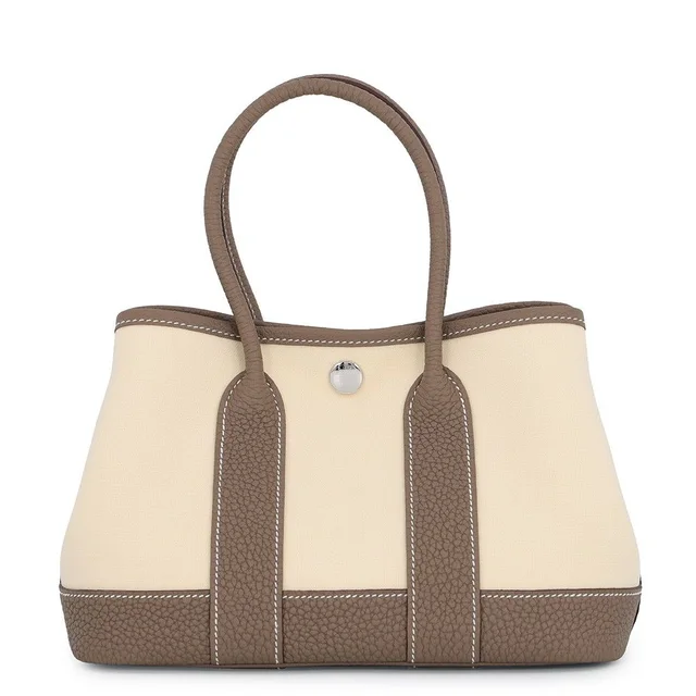 Hermès Tote Bag Neo Garden 23 Party Etoupe Vanilla Silver Toile Office Negonda in Taupe from The Reluxe
