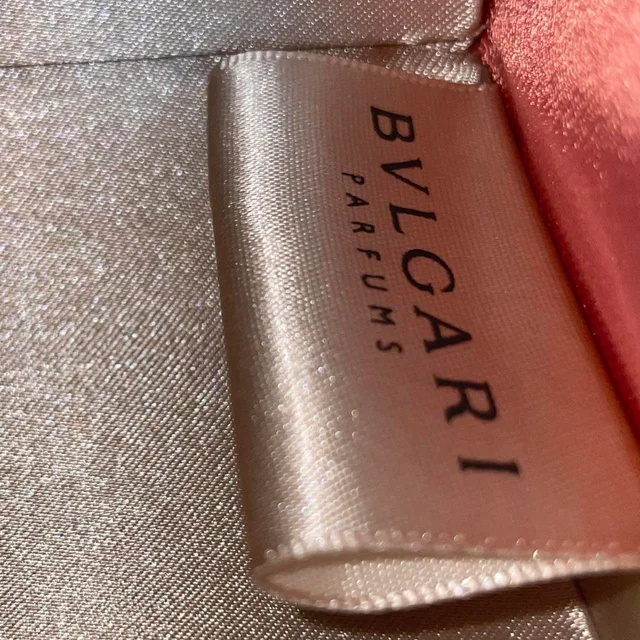 Bvlgari Women's Clutch bags - Orange/Gold in orange|gold from Depop, photo 3 of 4