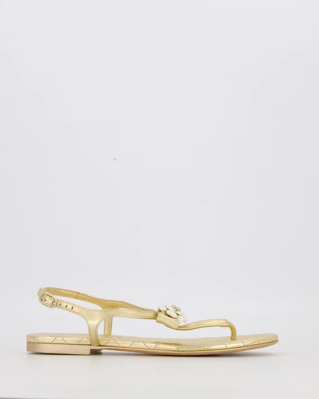 Chanel Gold Quilted Lambskin Flat Thong Sandals with Pearl Camellia and CC Logo Detail Size EU 37.5C in Gold Lambskin from Sellier
