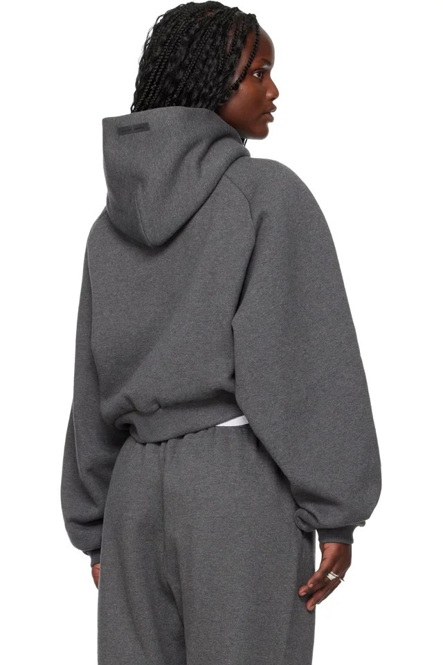 Fear of God ESSENTIALS Gray Holiday Embossed 90s Raglan Hoodie, photo 3 of 4 from SSENSE