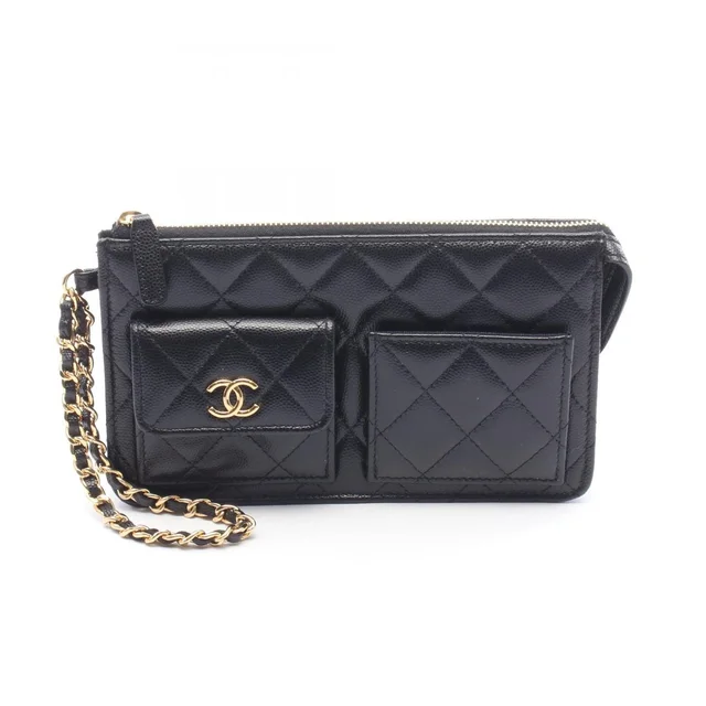 Chanel Clutch Quilted Wallet Black Caviar Leather Chain in Black Caviar leather from The Reluxe