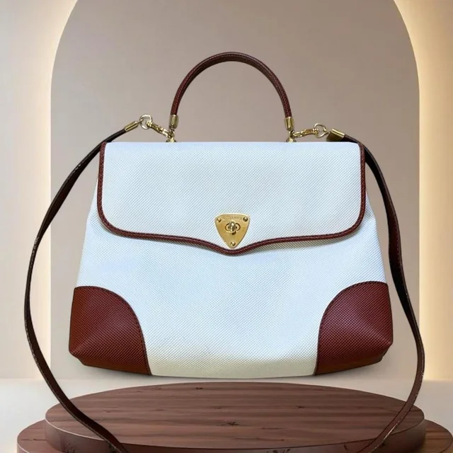 Bottega Veneta Women's Bag - White/Brown in red|brown|white from Depop, photo 1 of 1