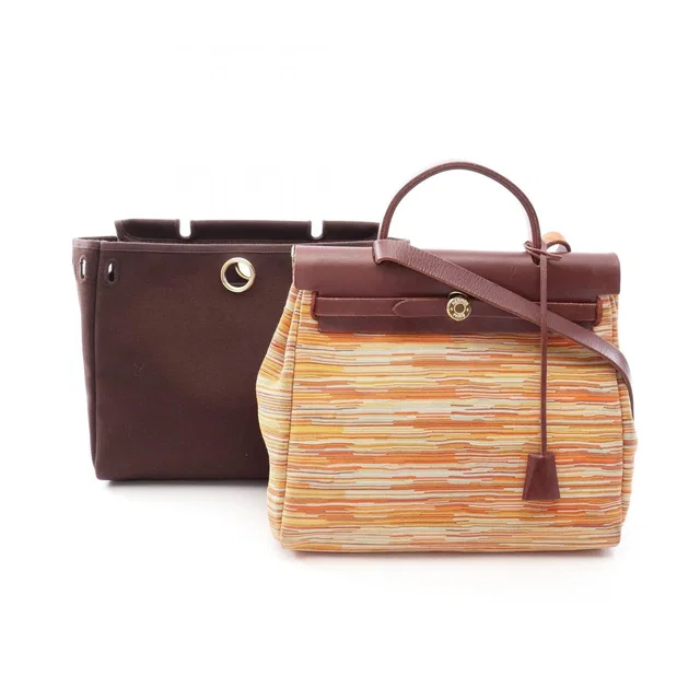 Hermès Handbag Herbag PM 2-Way Brown Multi Leather in Brown Leather from The Reluxe