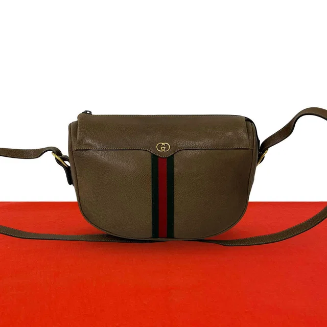 Gucci Vintage Sherry Line GG Logo Leather Mini Shoulder Bag Pochette Brown in Brown Leather from The Reluxe