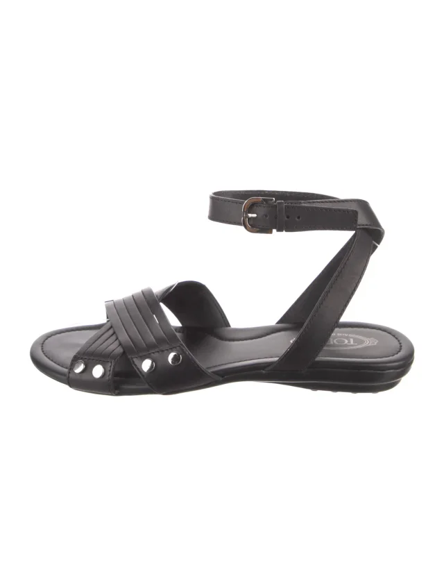 Tod's Leather Studded Accents Gladiator Sandals in black Leather from The RealReal