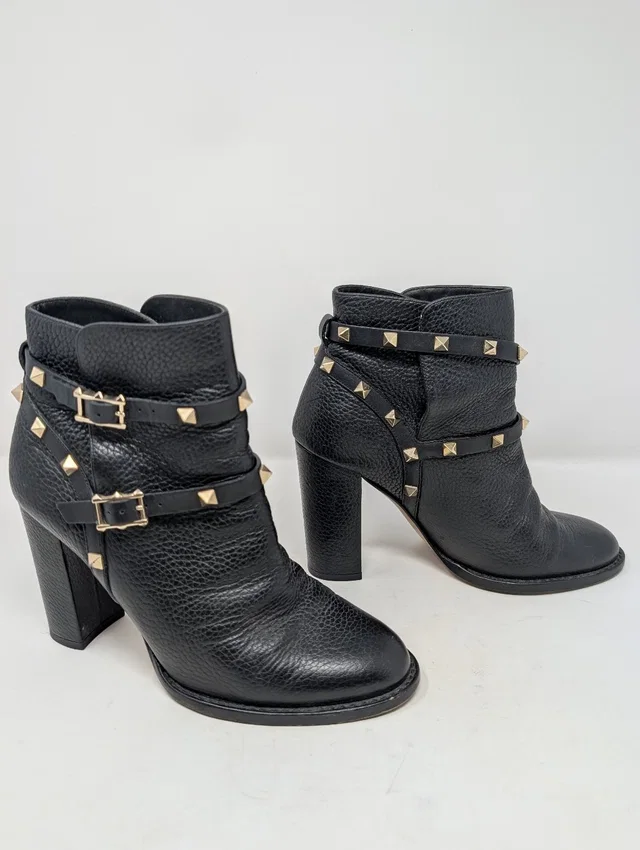Valentino Garavani Rockstud Moto Ankle Boots Black Pebbled Leather Size 38 in black Leather from Poshmark