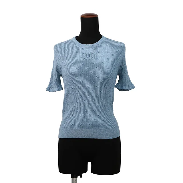 Chanel CC Logo Short-Sleeve Ribbed Knit Sweater Size 38 BlueP79244 Cotton 98% Polyamide 1%… from GALLERY RARE