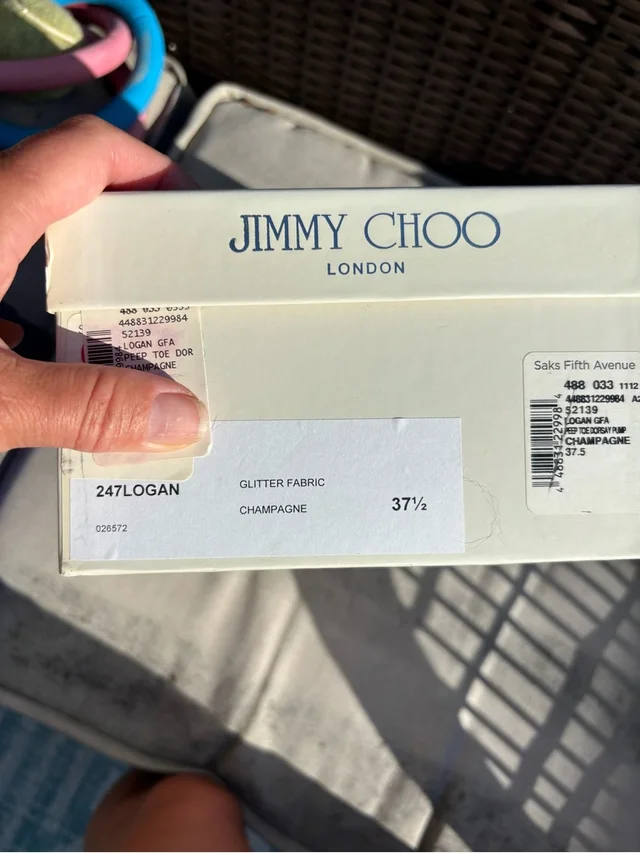 Jimmy Choo Champagne Glitter Logan Shoe Box in white from Poshmark