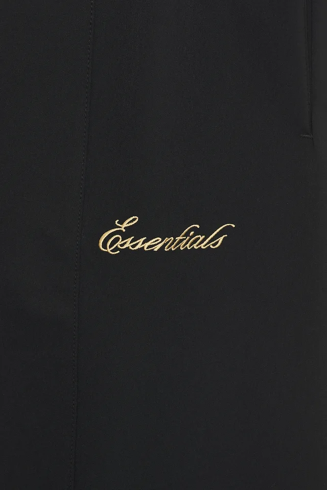 Fear of God ESSENTIALS Signature Track Pant in Vintage Black, photo 6 of 6 from REVOLVE (Canada)