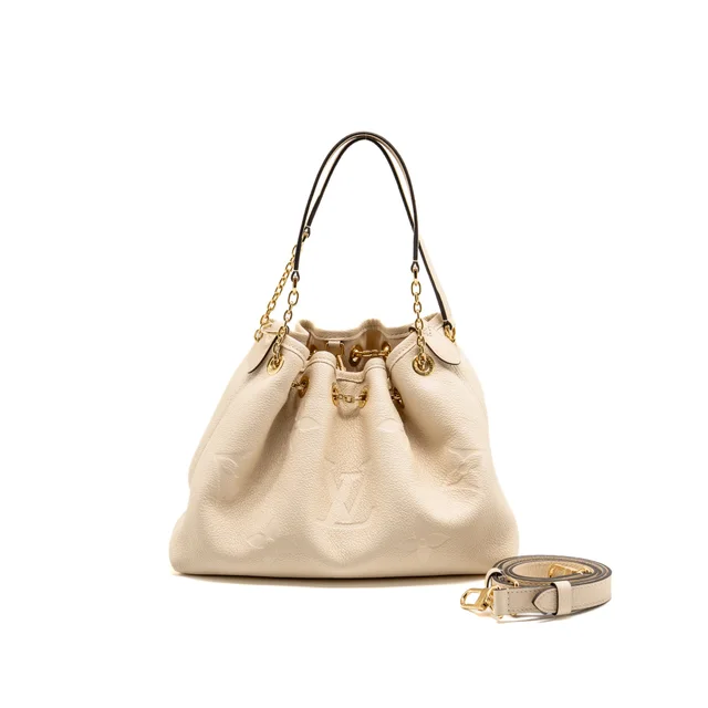 Louis Vuitton Bundle Monogram Empreinte leather cream GHW in White Leather from EMIER