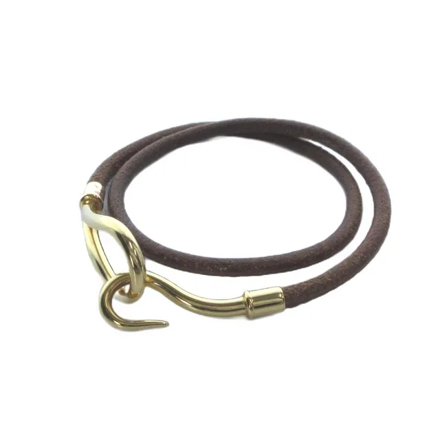 Hermès Bracelet Bangle Logo Leather Brown in Brown Leather from The Reluxe