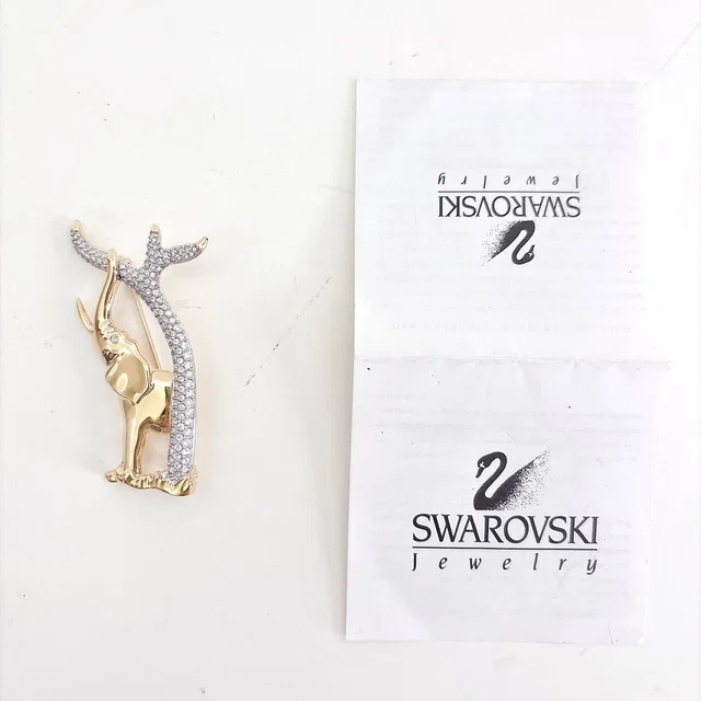 Swarovski Elephant Brooch Gold Tone in gold from Poshmark