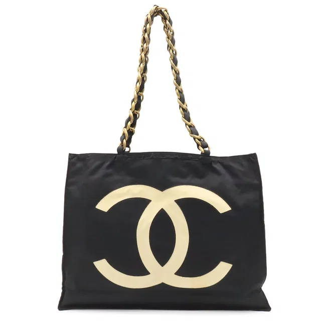 Chanel CC Logo Chain Tote Large Shoulder Bag Nylon Canvas Black White Gold in Black Canvas from The Reluxe