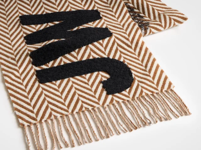 J.W.Anderson JW Anderson Logo Detailed Fringed Scarf, photo 3 of 3 from SENSER
