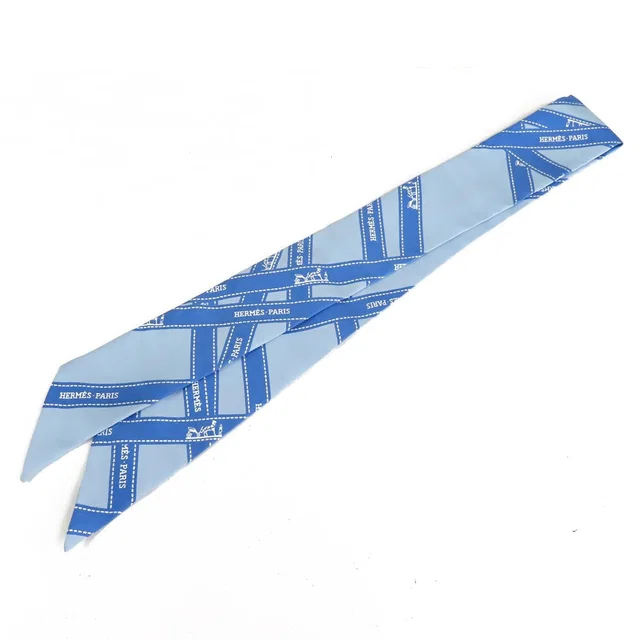 Hermès Twilly Blue Silk Bolduc Pattern Scarf in Blue Silk from The Reluxe