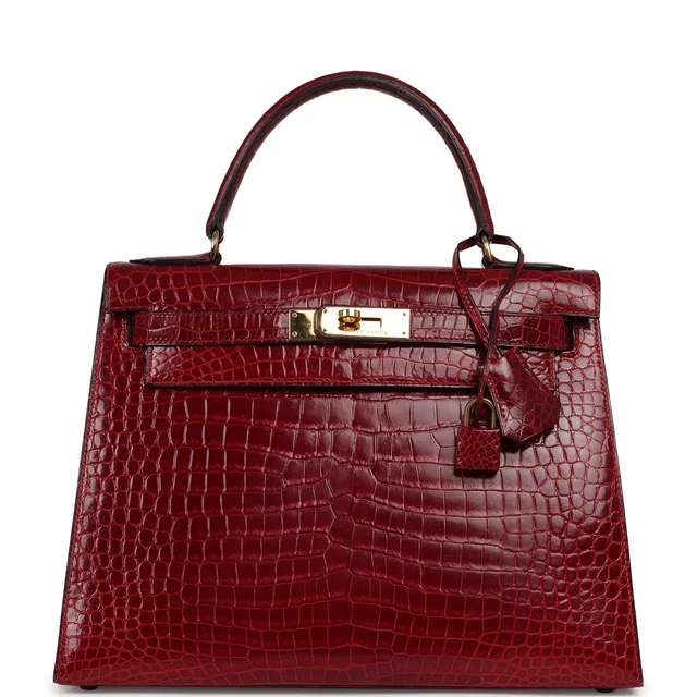 Hermès Vintage Kelly Sellier 28 Bordeaux Shiny Porous Crocodile Gold Hardware in Burgundy Crocodile from Madison Avenue Couture