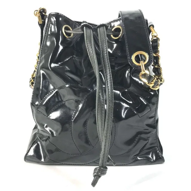 Chanel Shoulder Bag Drawstring CC Logo Enamel Black in Black from The Reluxe
