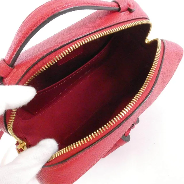 Louis Vuitton Saintonge Monogram Empreinte Shoulder Bag in Red Calfskin from LuxUness, photo 8 of 8