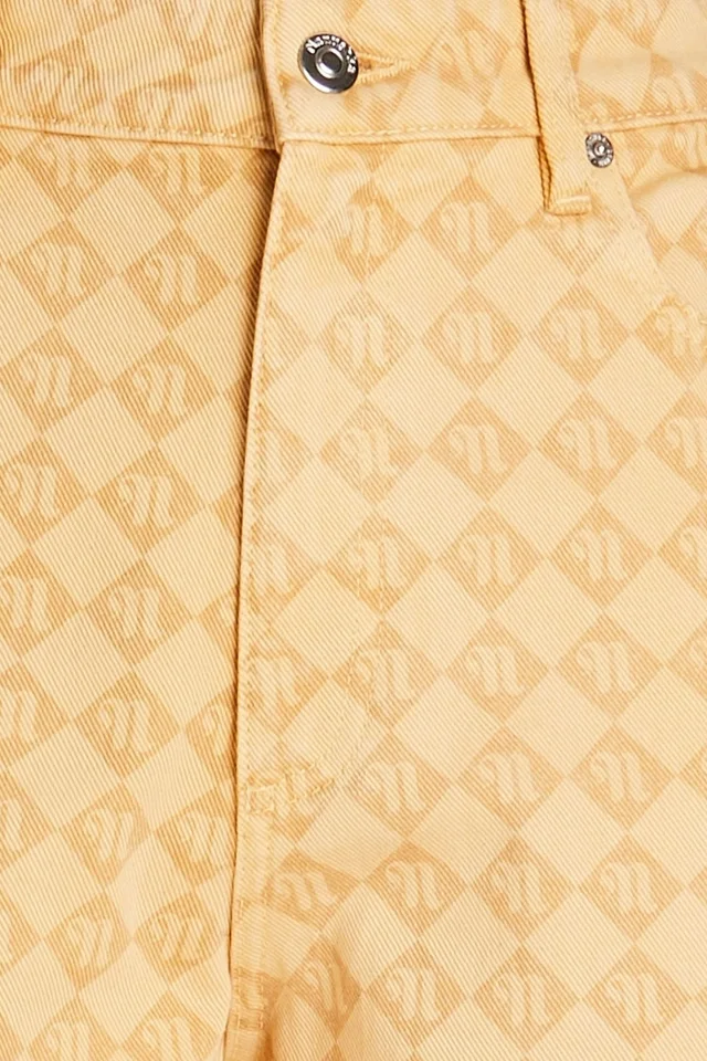 Nanushka Logo-Print High-Rise Kick-Flare Jeans in Sand, photo 4 of 4 from THE OUTNET