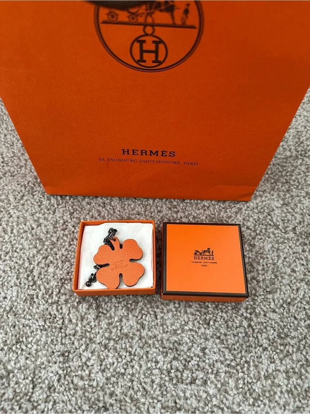 Hermès Orange Leather Clover Pendant Charm. Authentic in orange|brown|red Leather from Poshmark, photo 7 of 7