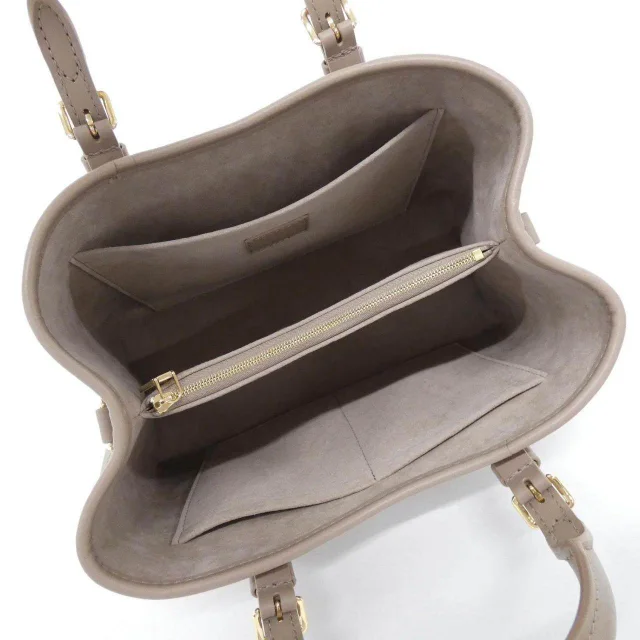 Louis Vuitton Monogram Empreinte Tote Bag in Beige Calfskin from LuxUness, photo 4 of 5